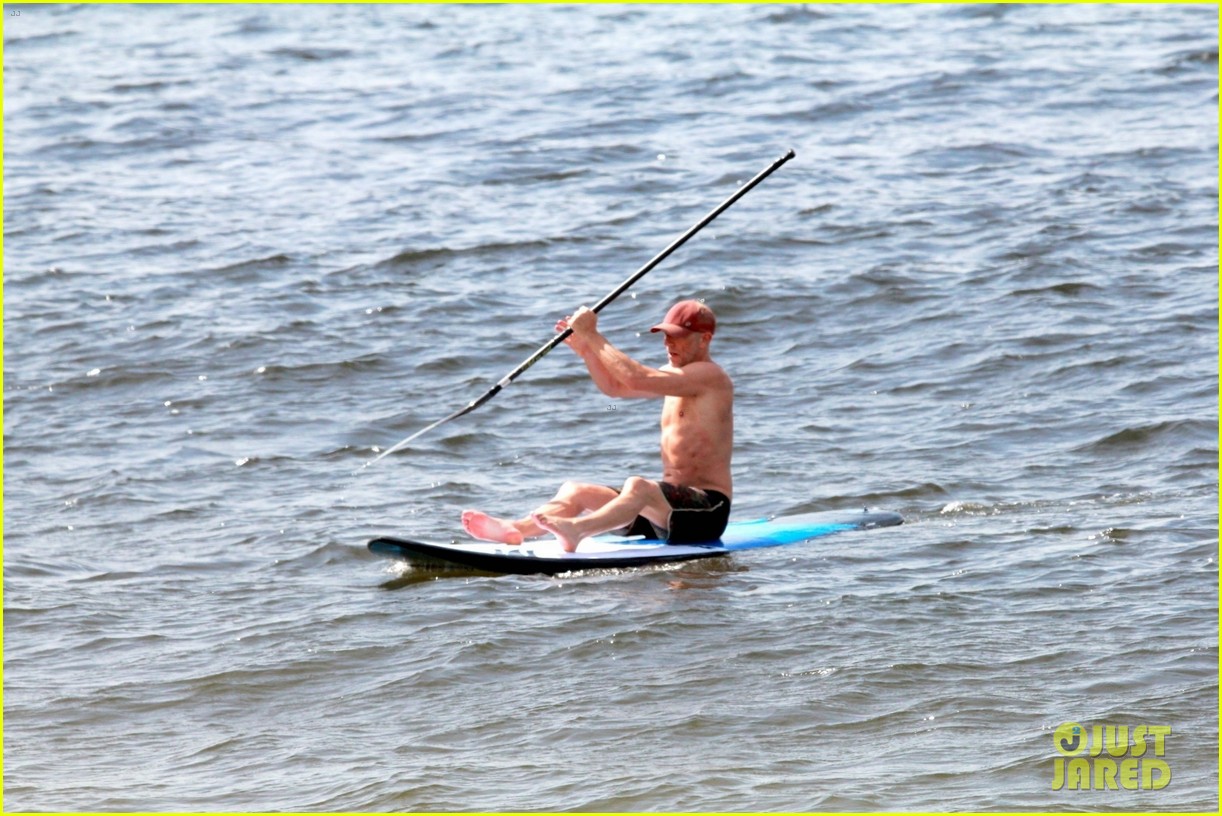 vincent cassel paddleboarding with wife tina kunakey 474690751