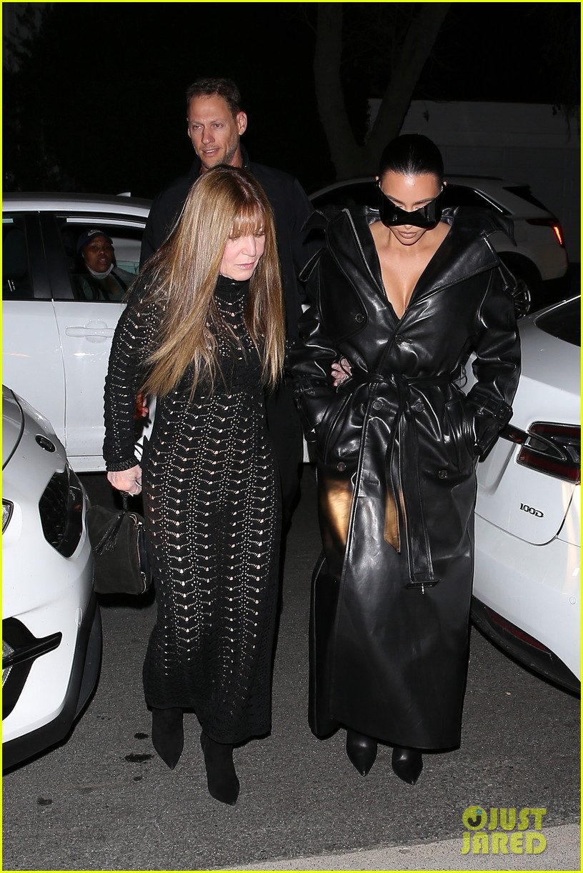 kim kardashian wears large sunglasses black leather trench coat art gallery 17