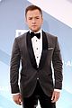 taron egerton contracts covid out of play for week 02