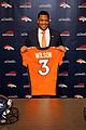 russell wilson joined by his family introduced to denver broncos 09