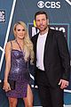 carrie underwood purple animal print dress mike fisher cmt awards 18