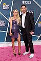 carrie underwood purple animal print dress mike fisher cmt awards 19
