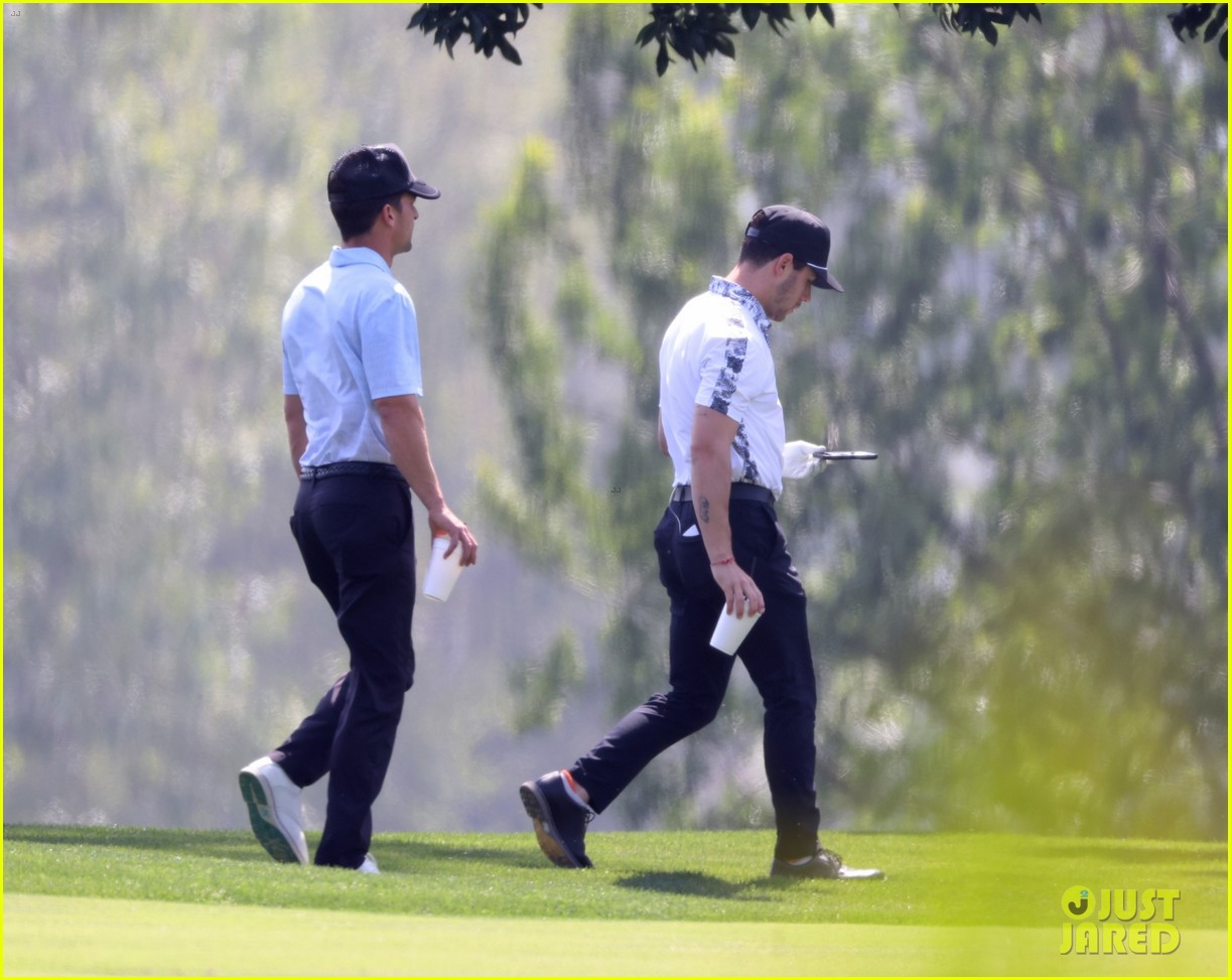nick jonas spends the day playing golf with daren kagasoff 354760781