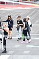 lily james flies out of glastonbury with gemma chan 05