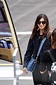 lily james flies out of glastonbury with gemma chan 33