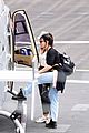 lily james flies out of glastonbury with gemma chan 34