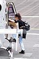 lily james flies out of glastonbury with gemma chan 35