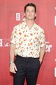 miles teller wears floral print shirt to the offer fyc event 14