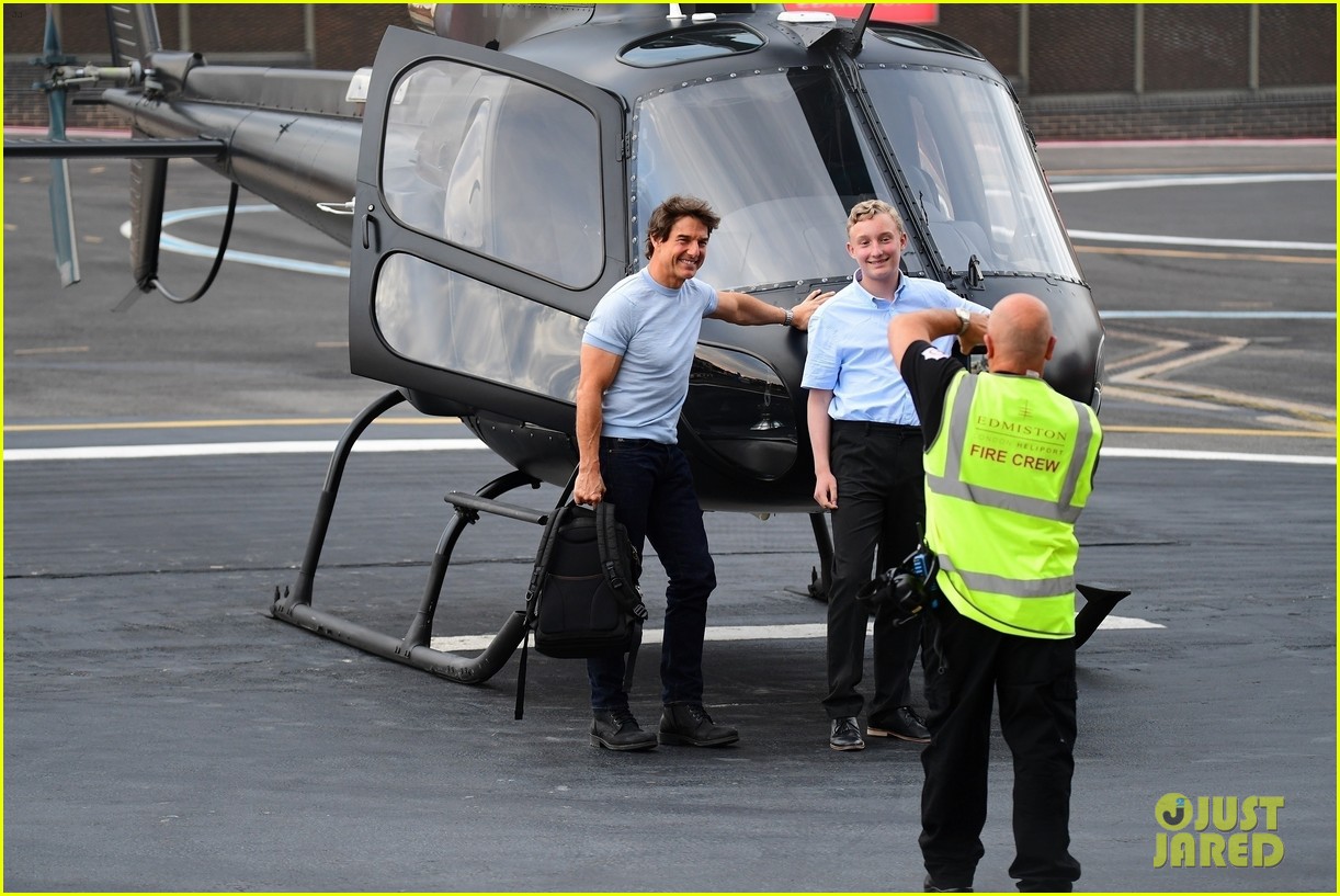 tom cruise hops into the pilot seat for helicopter ride around london 01