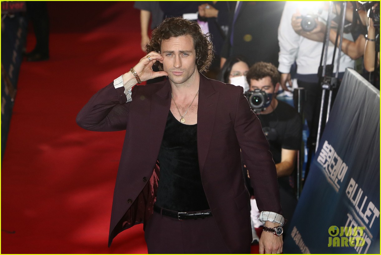 Brad Pitt & Aaron TaylorJohnson Do Adorable Heart Poses at 'Bullet Train' Seoul Premiere