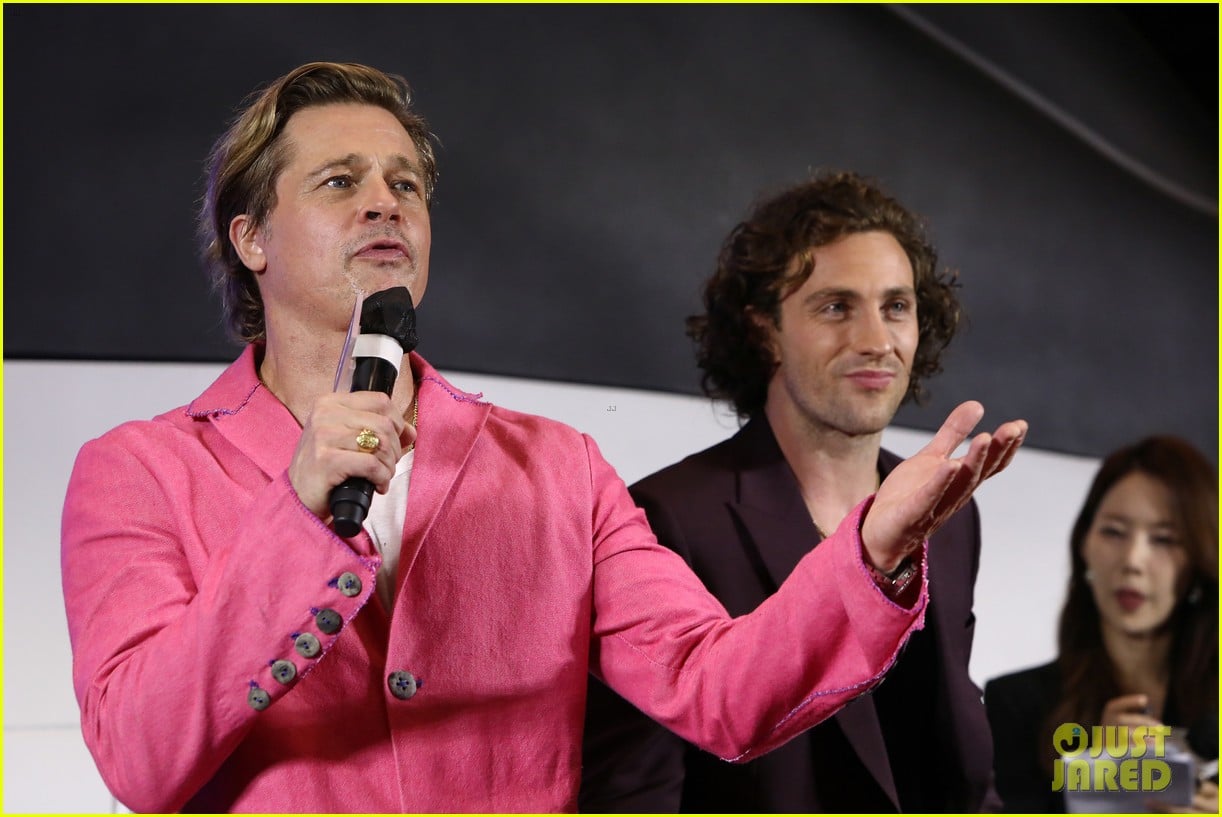 Brad Pitt & Aaron TaylorJohnson Do Adorable Heart Poses at 'Bullet Train' Seoul Premiere