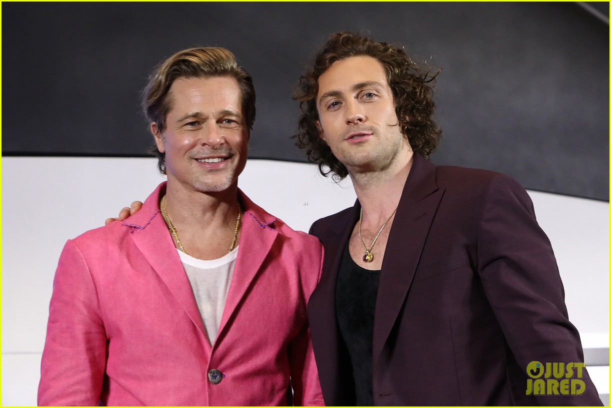 Brad Pitt & Aaron TaylorJohnson Do Adorable Heart Poses at 'Bullet Train' Seoul Premiere