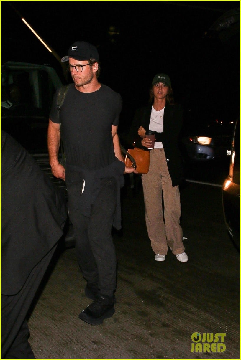 Top Gun: Maverick&rsquo;s Glen Powell Catches Flight Out of LAX with