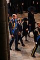 princess charlotte reminds prince george to bow funeral 07