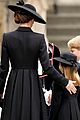 princess charlotte reminds prince george to bow funeral 09
