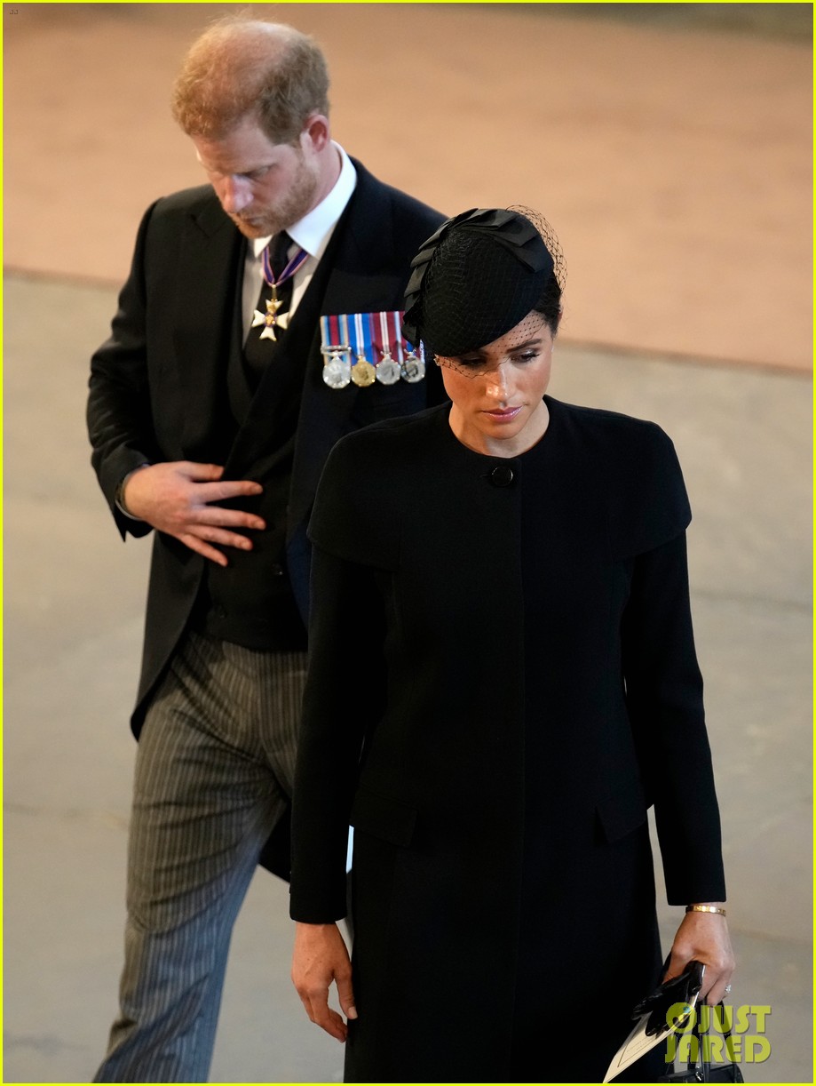 Prince Harry & Meghan Markle Hold Hands While Leaving Queen Elizabeth