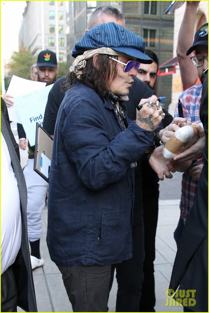 Johnny Depp is Greeted by Fans While Stepping Out in Boston Photo