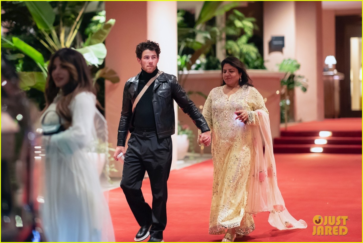 Nick Jonas Holds Hands with Priyanka Chopra's Mom While Out Celebrating