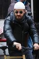 justin theroux bundles up for afternoon bike ride 02