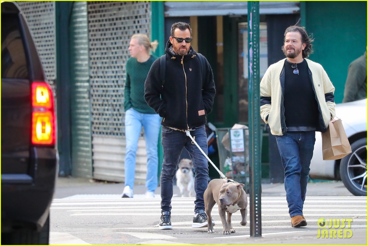 justin theroux goes for afternoon walk with dog kuma 08