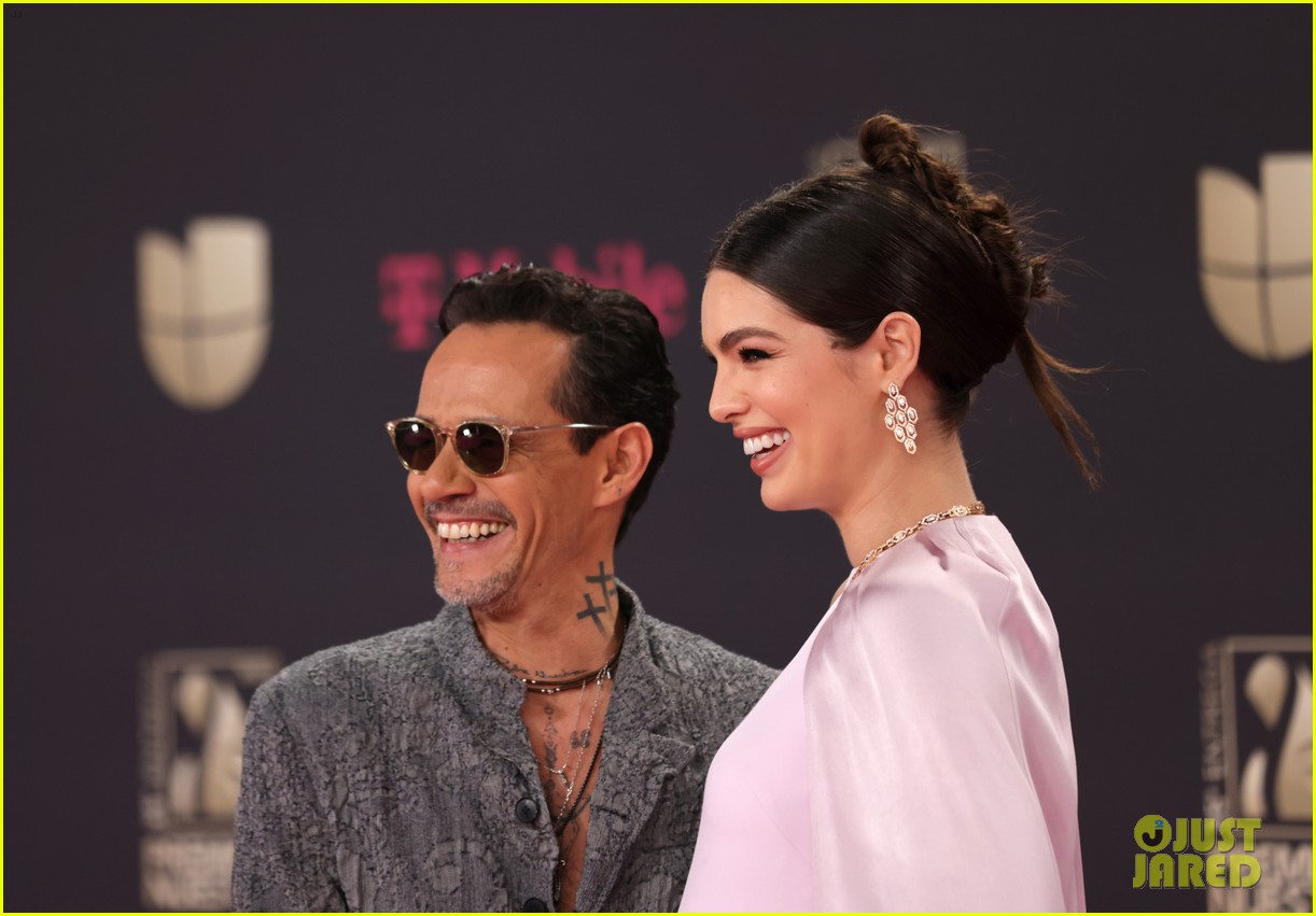Marc Anthony Cradles Wife Nadia's Baby Bump While Walking Red Carpet at