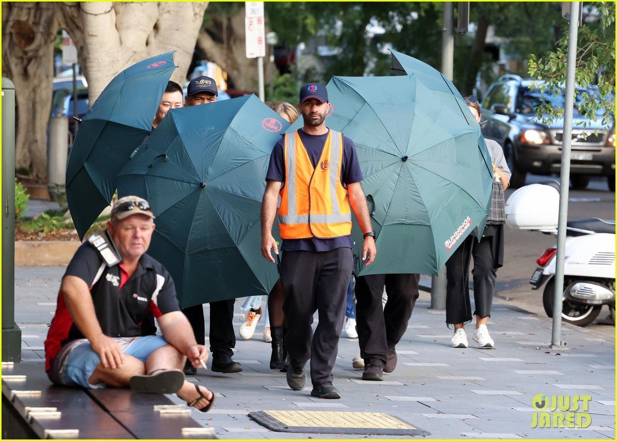 Sydney Sweeney Gets Covered By Giant Umbrellas While Shooting Top