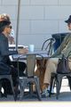 jacob elordi wears overalls grabbing coffee with a friend 13