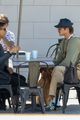 jacob elordi wears overalls grabbing coffee with a friend 20