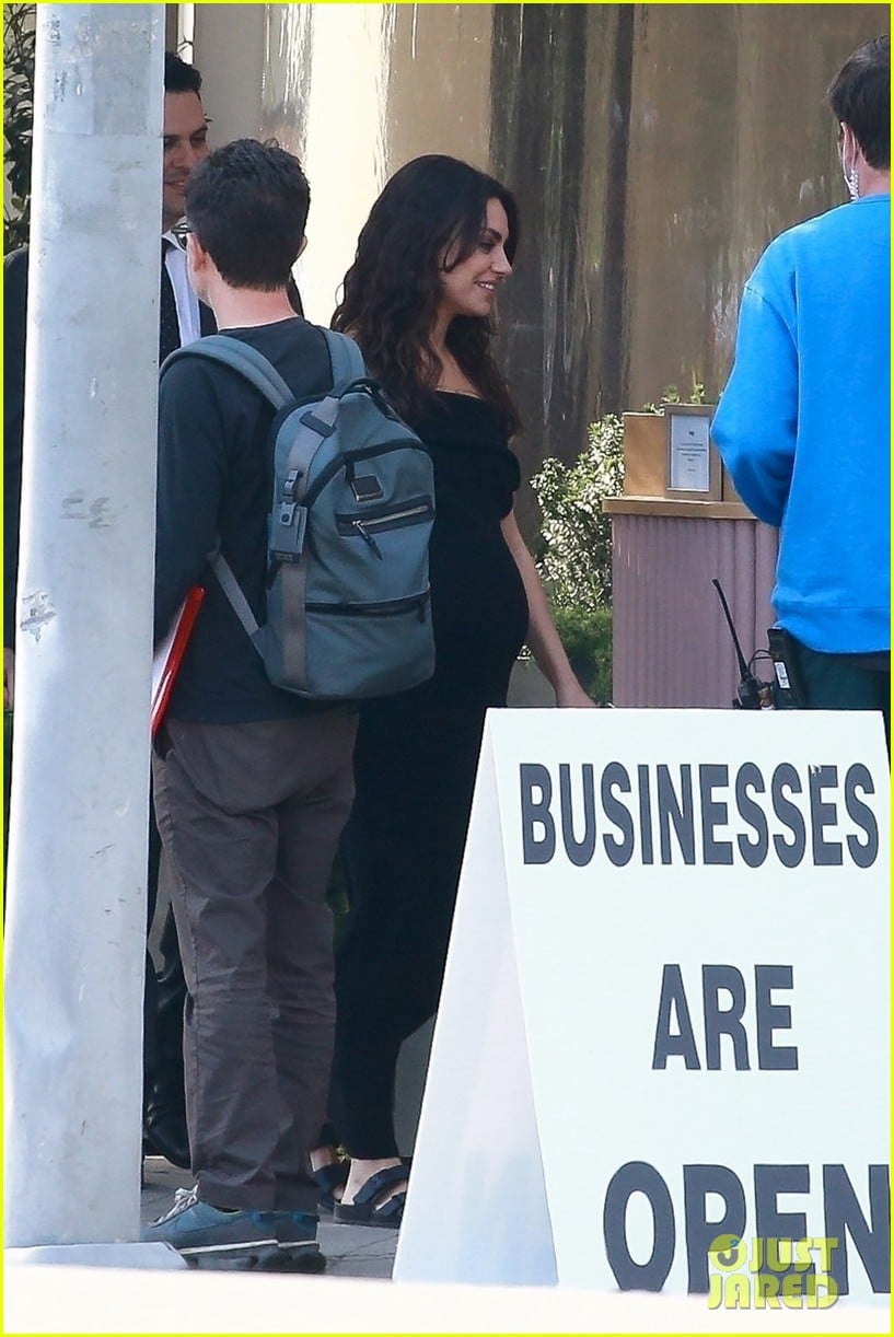 Mila Kunis Sports Fake Baby Bump on Set of 'Goodrich' with Co-Star