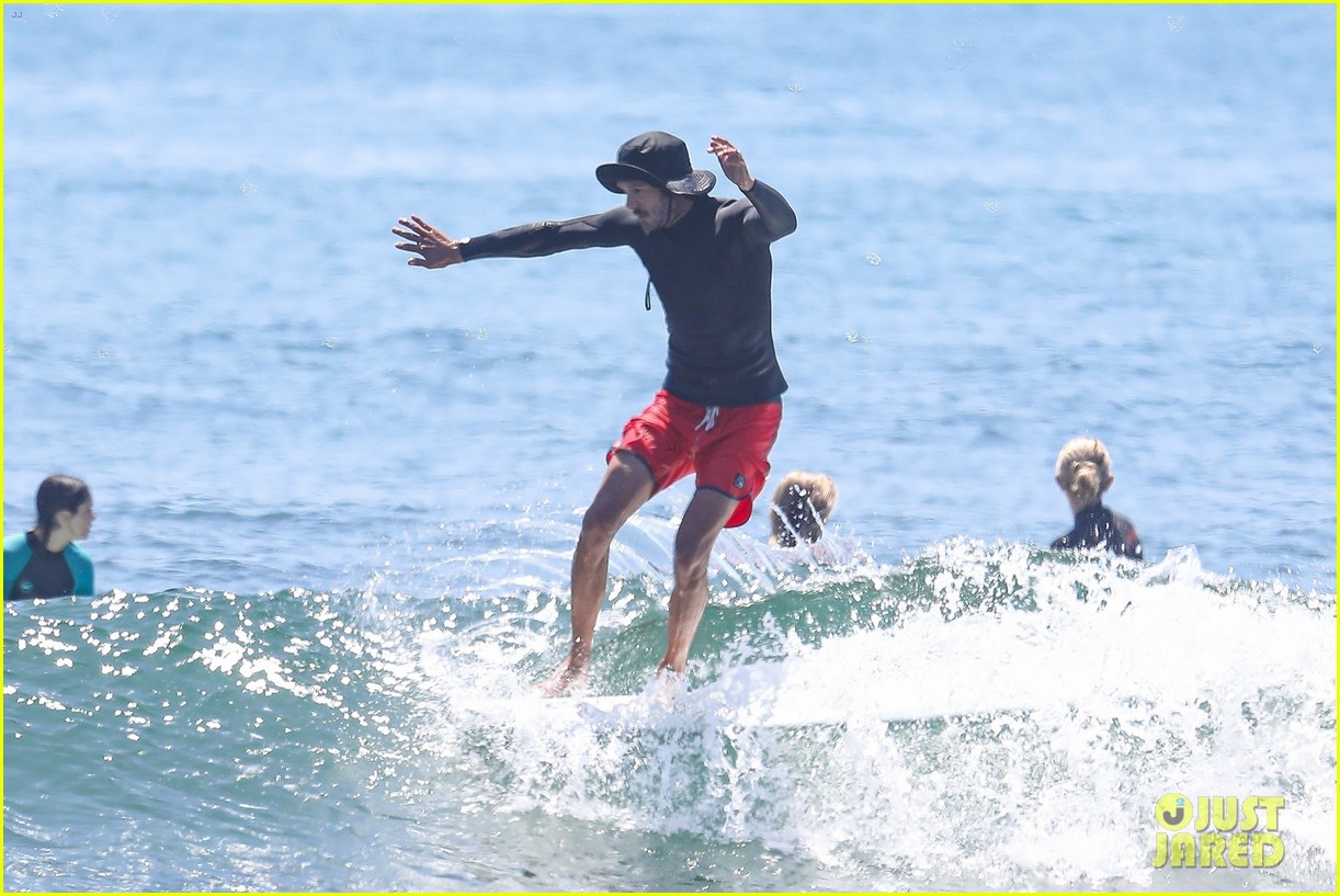 adam brody goes surfing in malibu 224956532