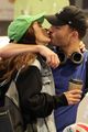 ed westwick amy jackson share a kiss milan airport 03