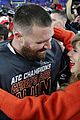 taylor and travis hugging after afc championship04