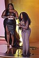 lizzo presents award to longtime friend sza at grammys 05