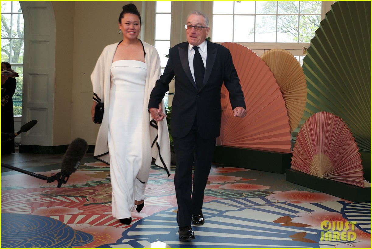 Robert De Niro & Girlfriend Tiffany Chen Hold Hands at White House