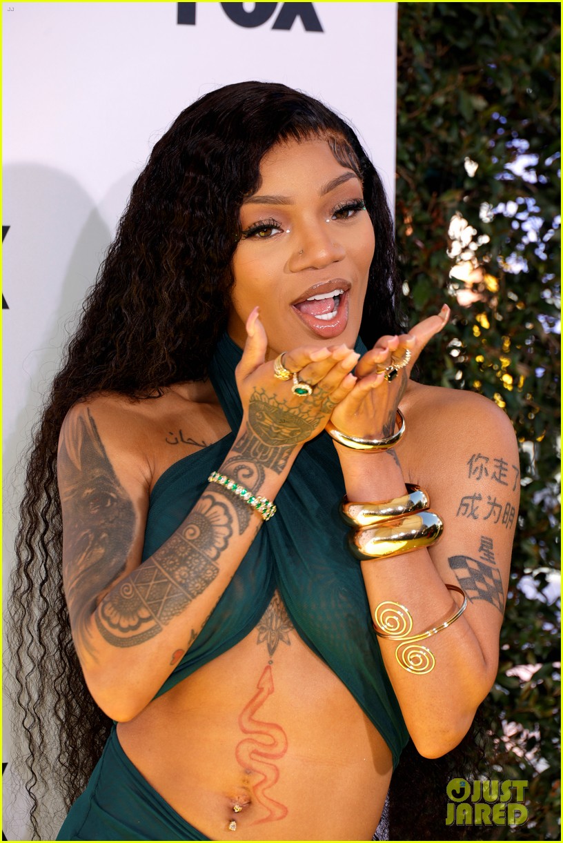 Ice Spice Tattoos Shine Brighter Than Ever