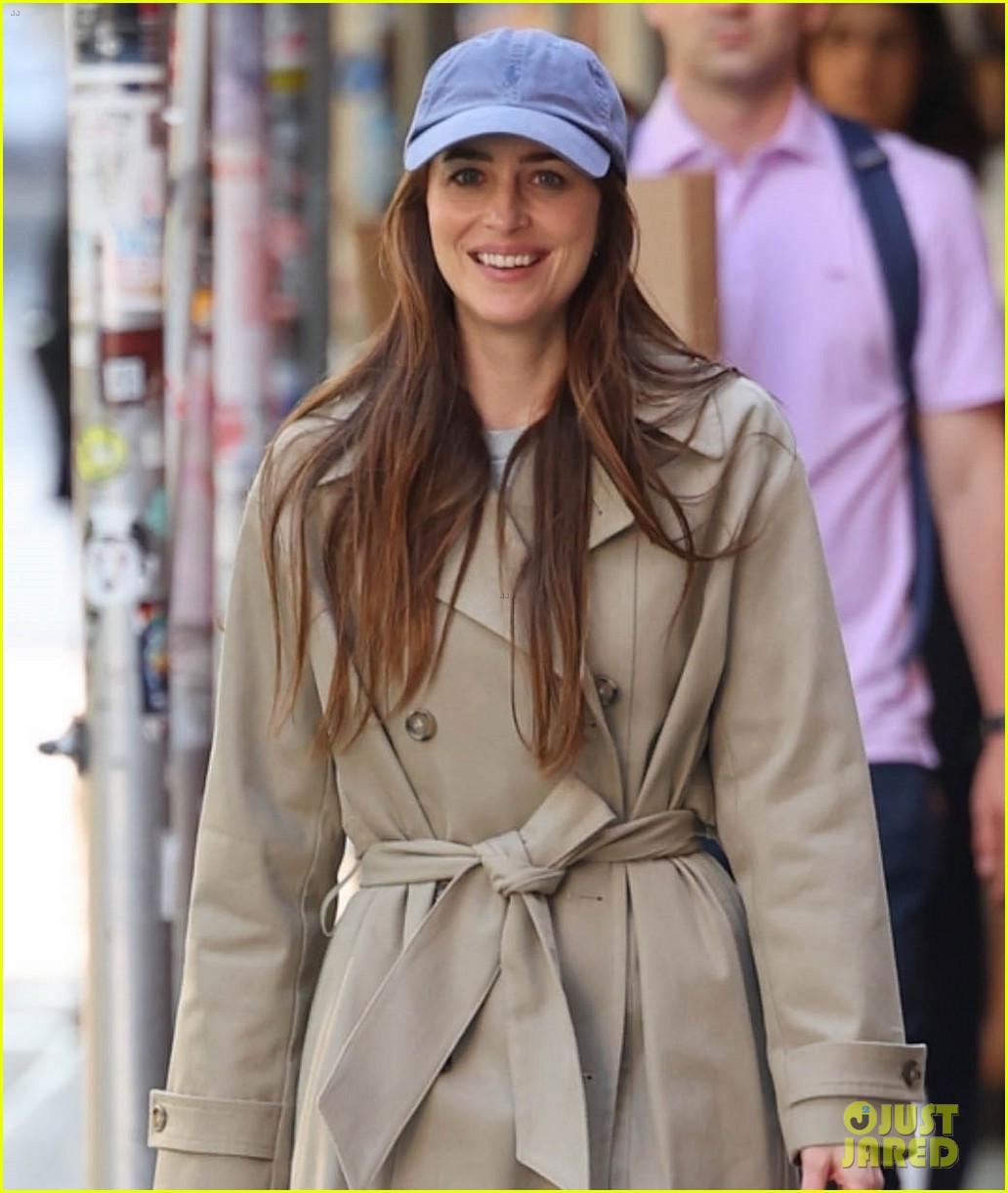 Dakota Johnson Sports Trenchcoat & Baseball Hat on 'Materialists' Set in NYC: Photo 5045374 | Dakota Johnson, Materialists Photos - Vimarsana News