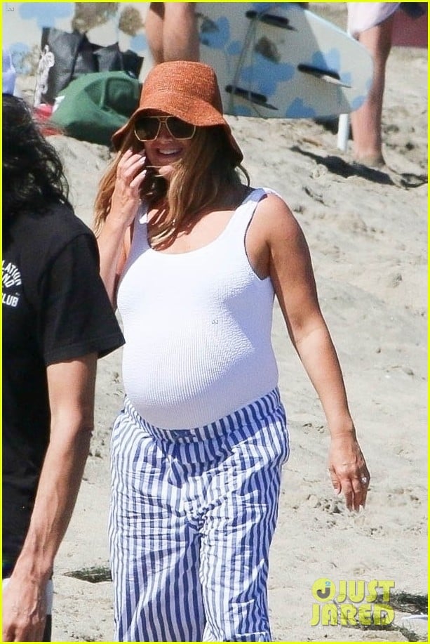 Radiant Ashley Tisdale Shows Off Her Baby Bump During Beach Day in