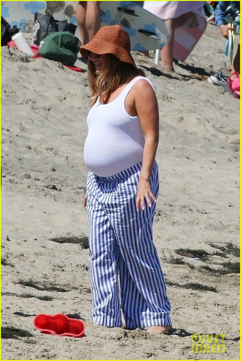 Radiant Ashley Tisdale Shows Off Her Baby Bump During Beach Day in