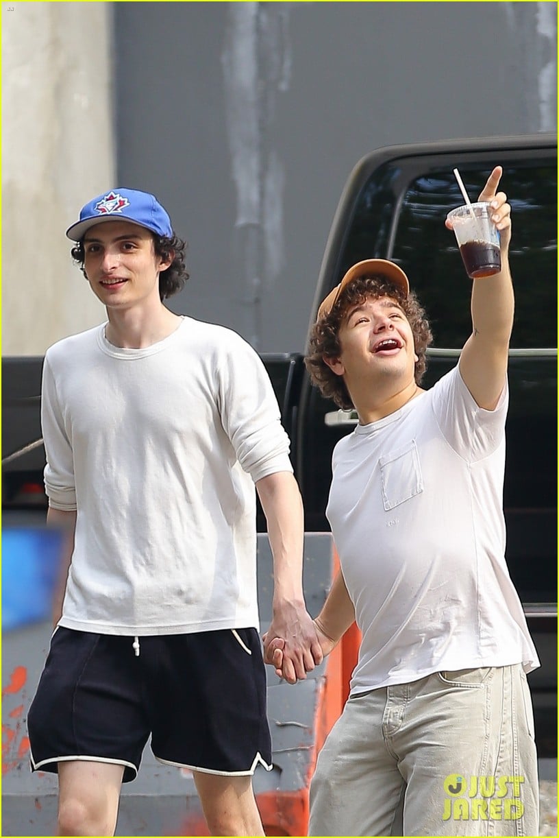 'Stranger Things' Stars Finn Wolfhard & Gaten Matarazzo Playfully Hold