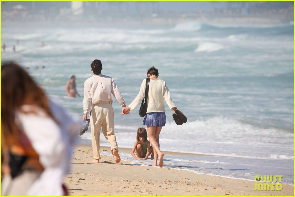 Rami Malek & Emma Corrin Still Going Strong a Year Later, Seen Holding