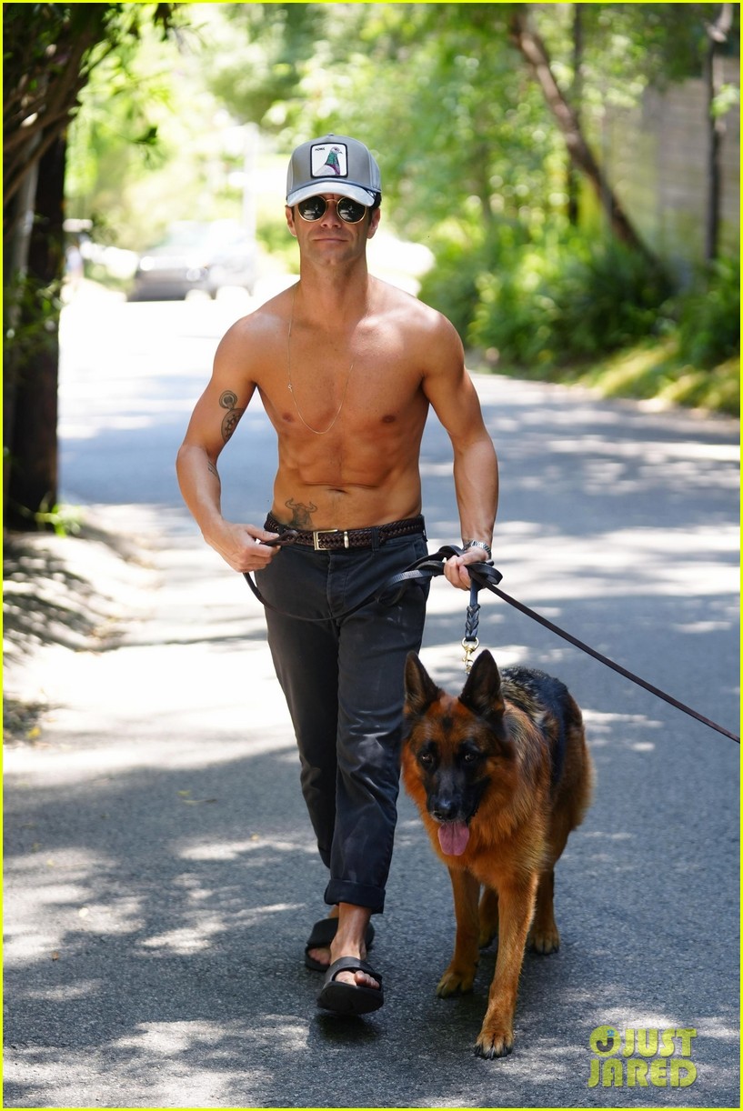 'DWTS' Pro Sasha Farber Goes Shirtless for Hike with His Dogs in Studio