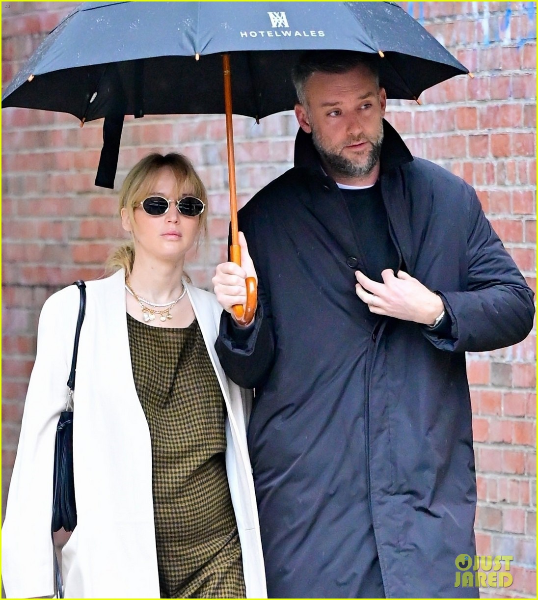 Pregnant Jennifer Lawrence & Husband Cooke Maroney Brave Rainy Weather