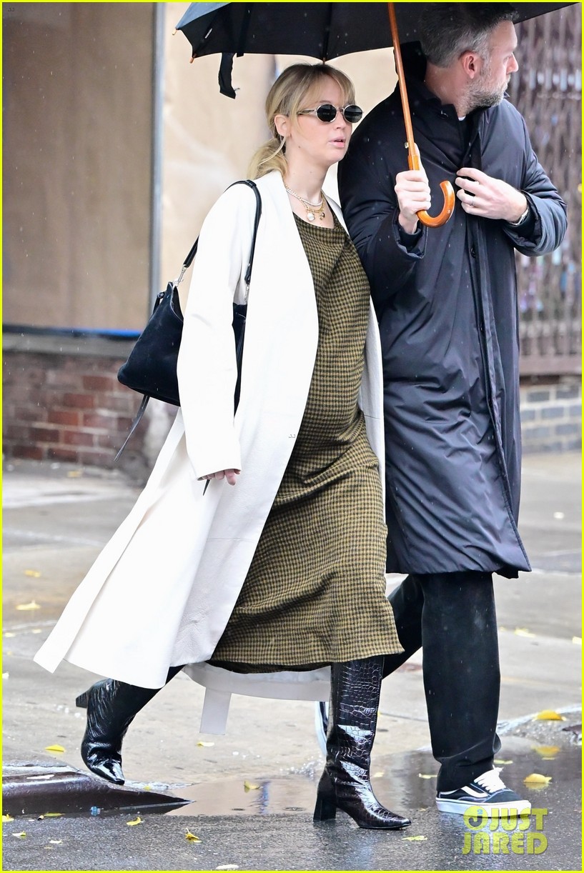 Pregnant Jennifer Lawrence & Husband Cooke Maroney Brave Rainy Weather