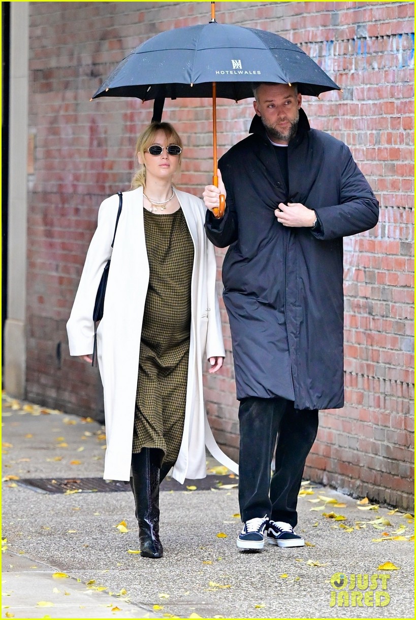 Pregnant Jennifer Lawrence & Husband Cooke Maroney Brave Rainy Weather