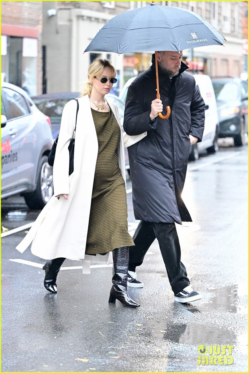 Pregnant Jennifer Lawrence & Husband Cooke Maroney Brave Rainy Weather