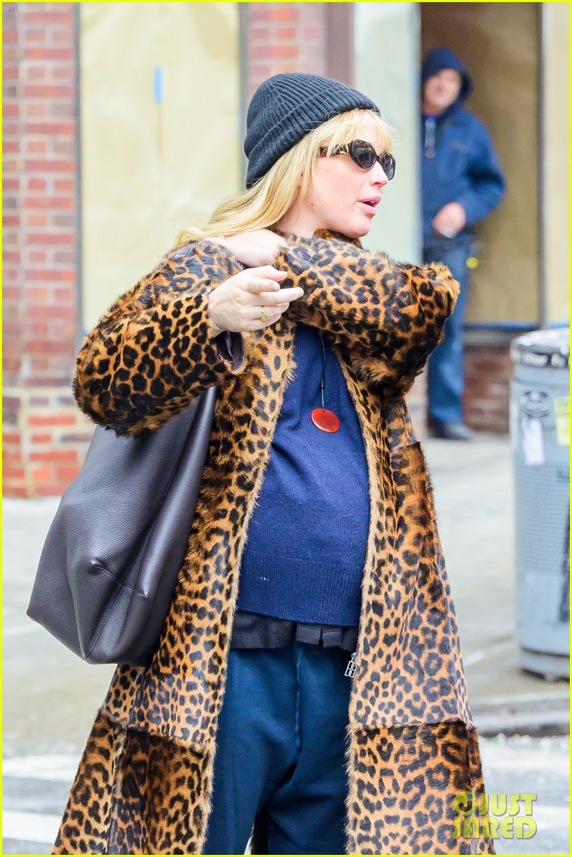 Pregnant Jennifer Lawrence Covers Her Baby Bump in Bold Leopard Print