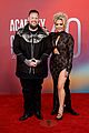 jelly roll bunnie xo show some pda on red carpet at acm awards 2025 01