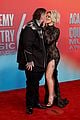 jelly roll bunnie xo show some pda on red carpet at acm awards 2025 05