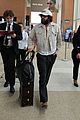 aaron taylor johnson sports bushy beard as he arrives in venice 05