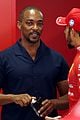 anthony mackie chats up lewis hamilton at hungarian grand prix 03
